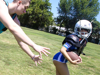 The two pro players go inside for a post practice bone sesh and ends the little celebration dance by spurting a big load of cum all over the cuties tight bod. Touch down!