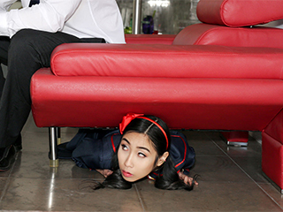 Eva Yi is so tiny she can be chased around the house for hours without being caught. She can hide under desks