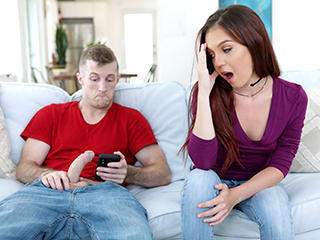 She helps him out by making him feel a little more comfortable while he masturbates on the couch. She plays with her pussy and watches him stroke his long ruler. Then he adds his cock to her pussy