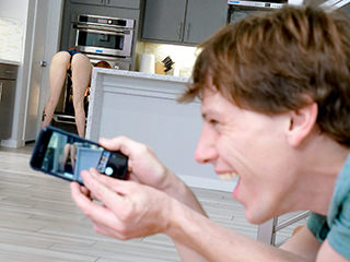 The sexy red haired lauren phillips was doing some chores around the house dressed in some super skimpy clothes. Just as she was about to start the dishes